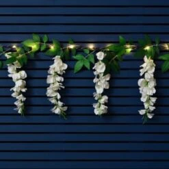 Solar Powered 180cm Artificial Leaf Garland With Wisteria Flowers - Warm White -Garden Furniture Store 379258 180cm solar powered artificial leaf garland with wisteria flowers 20 warm white micro leds 3